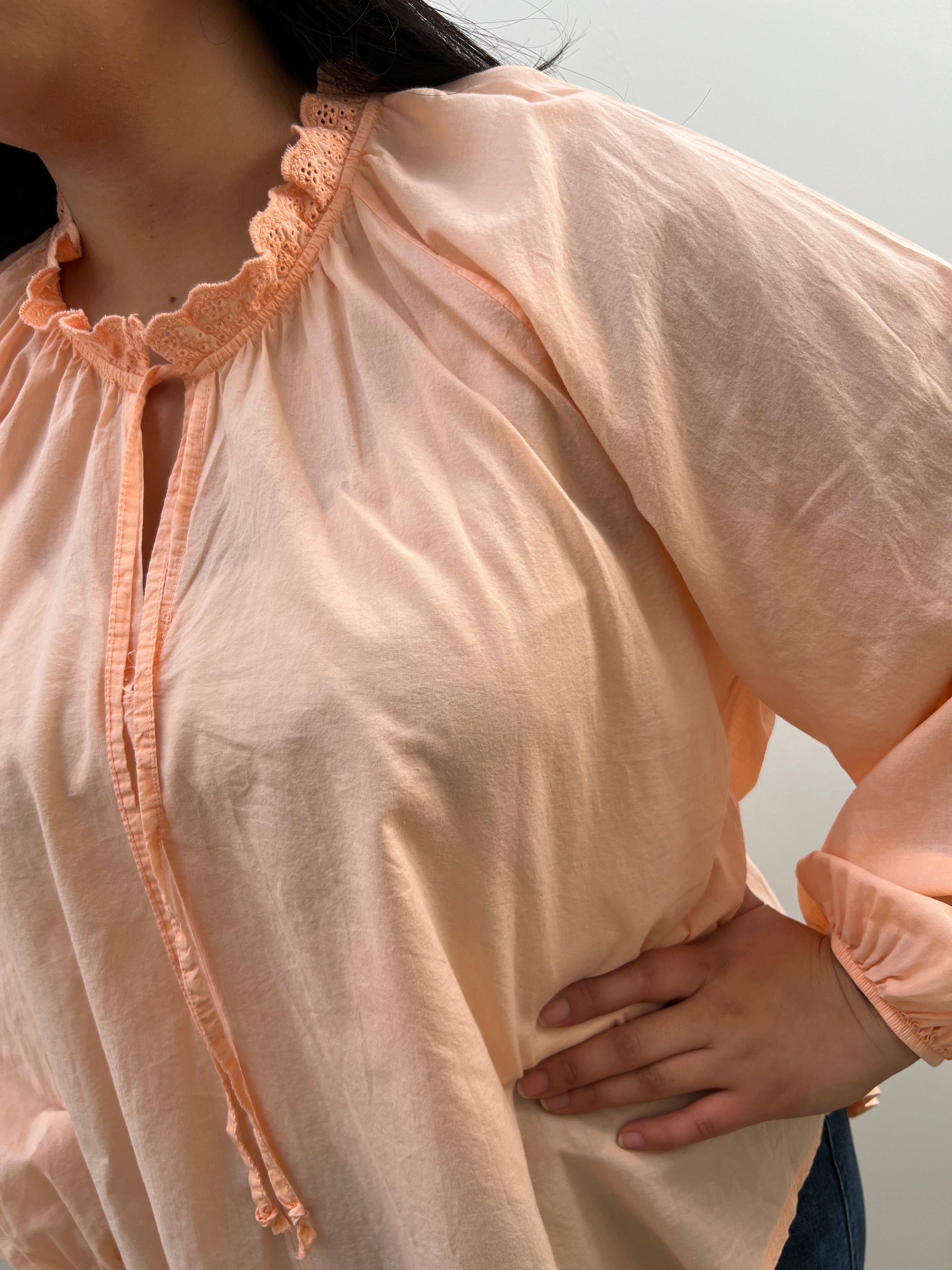 Light coral blouse with high collar. Solo Mia.