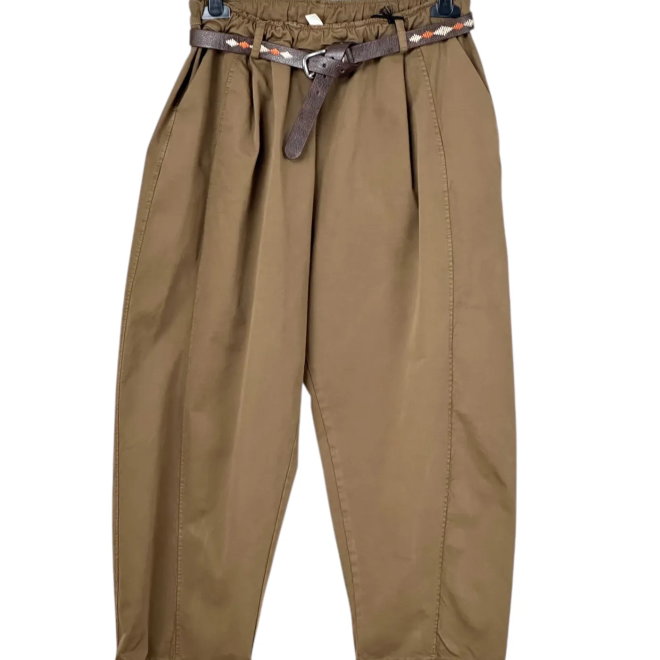 Brown pants on a hanger with a belt against a white background