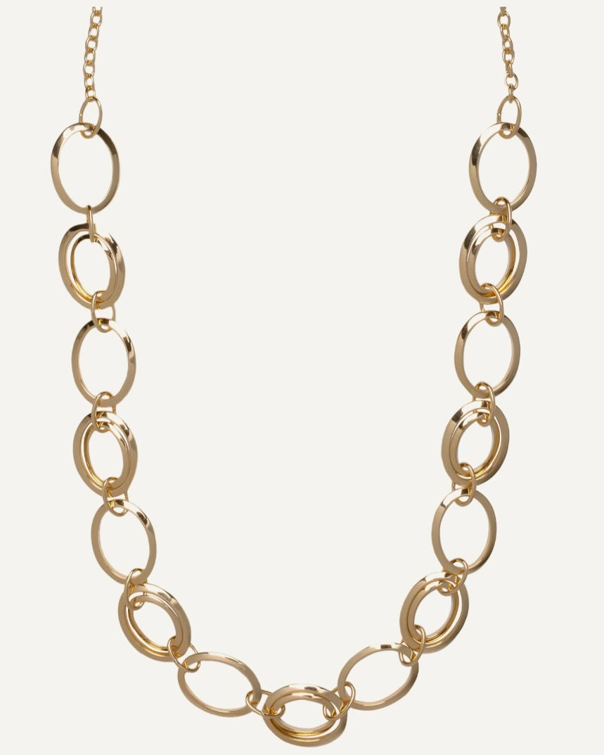 Gold chain necklace on a white background