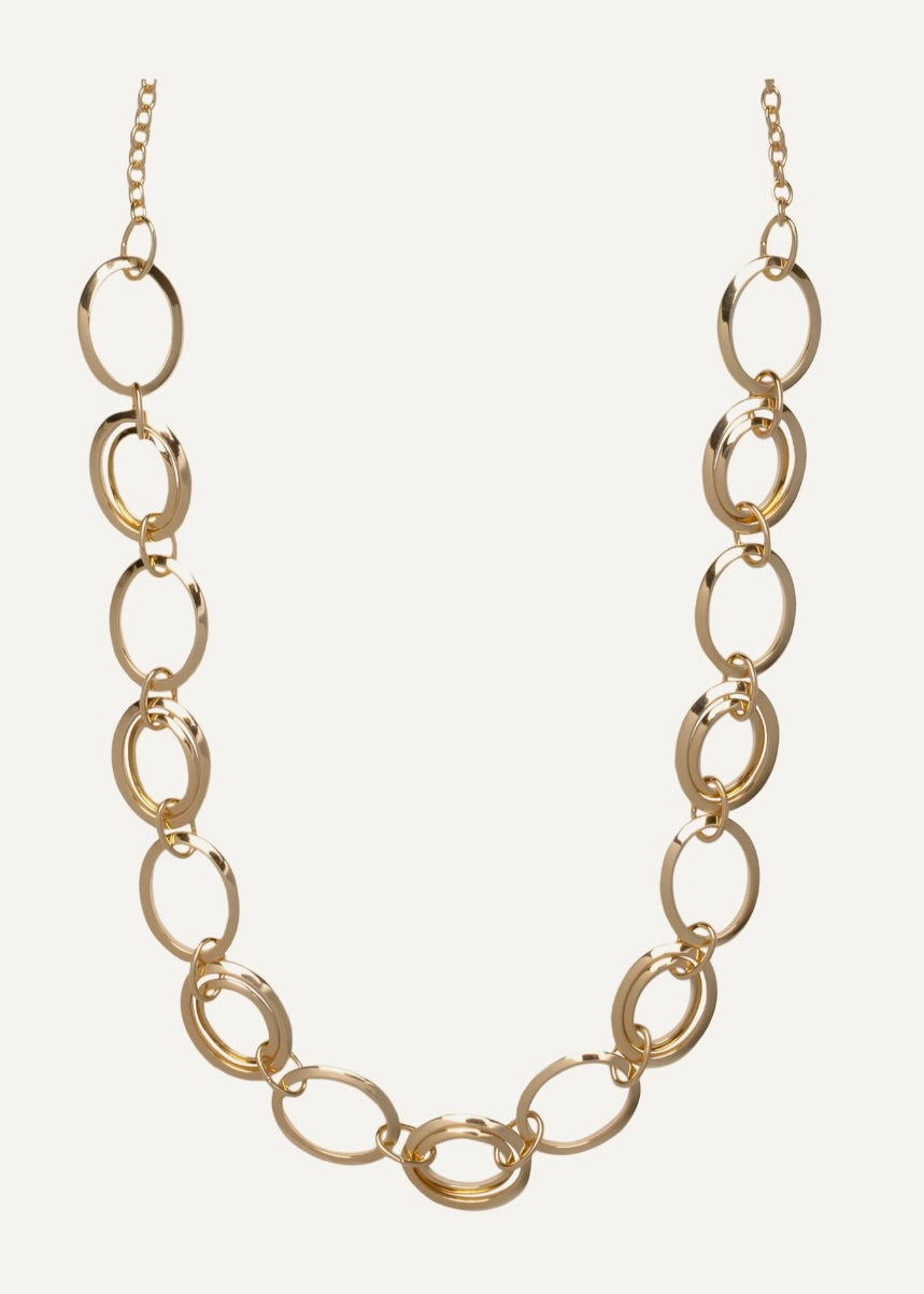 Gold chain necklace on a white background