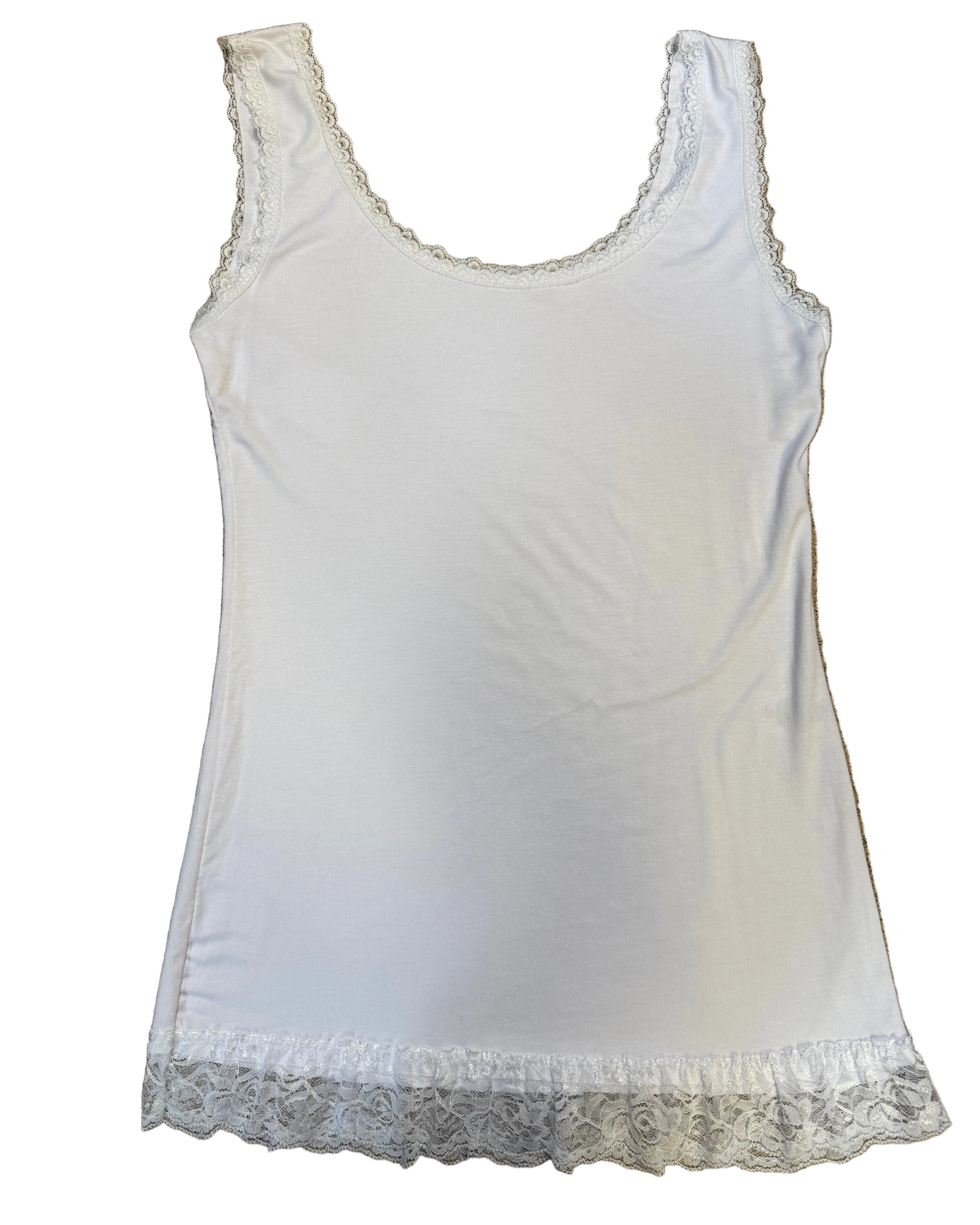 White tank top with lace trim on a brown surface