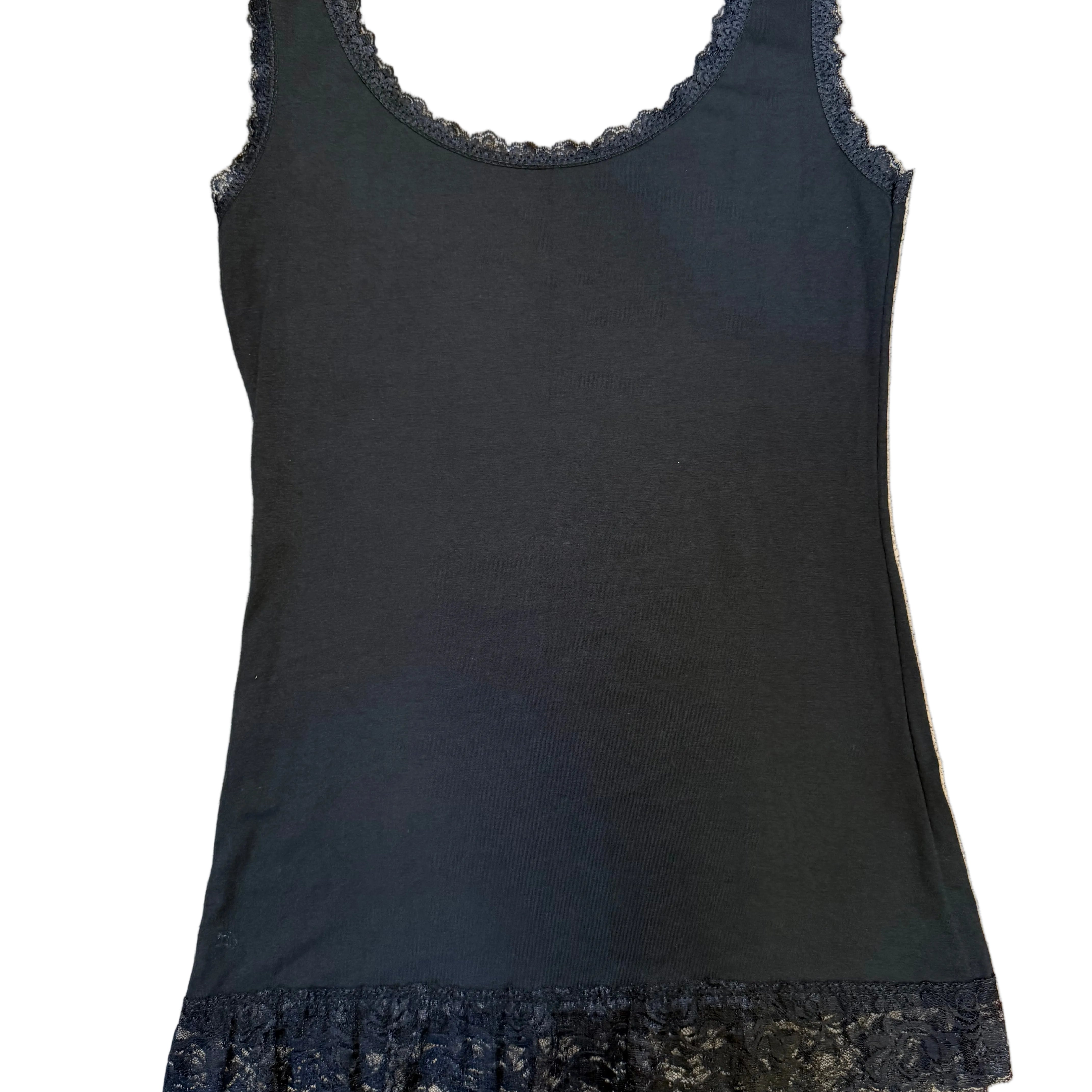 Black tank top with lace trim on a beige carpet