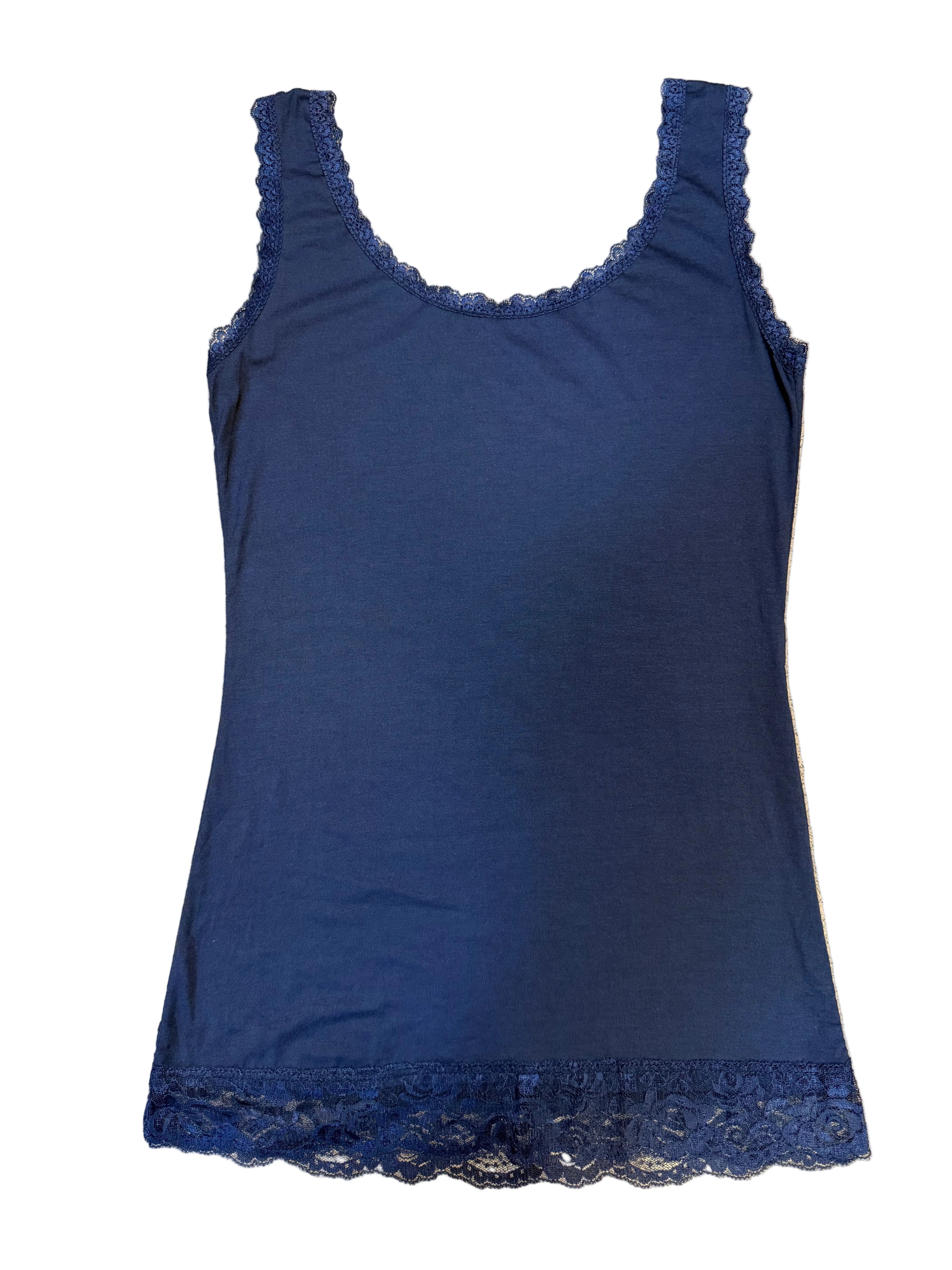 Navy blue dress with lace trim on a beige carpet