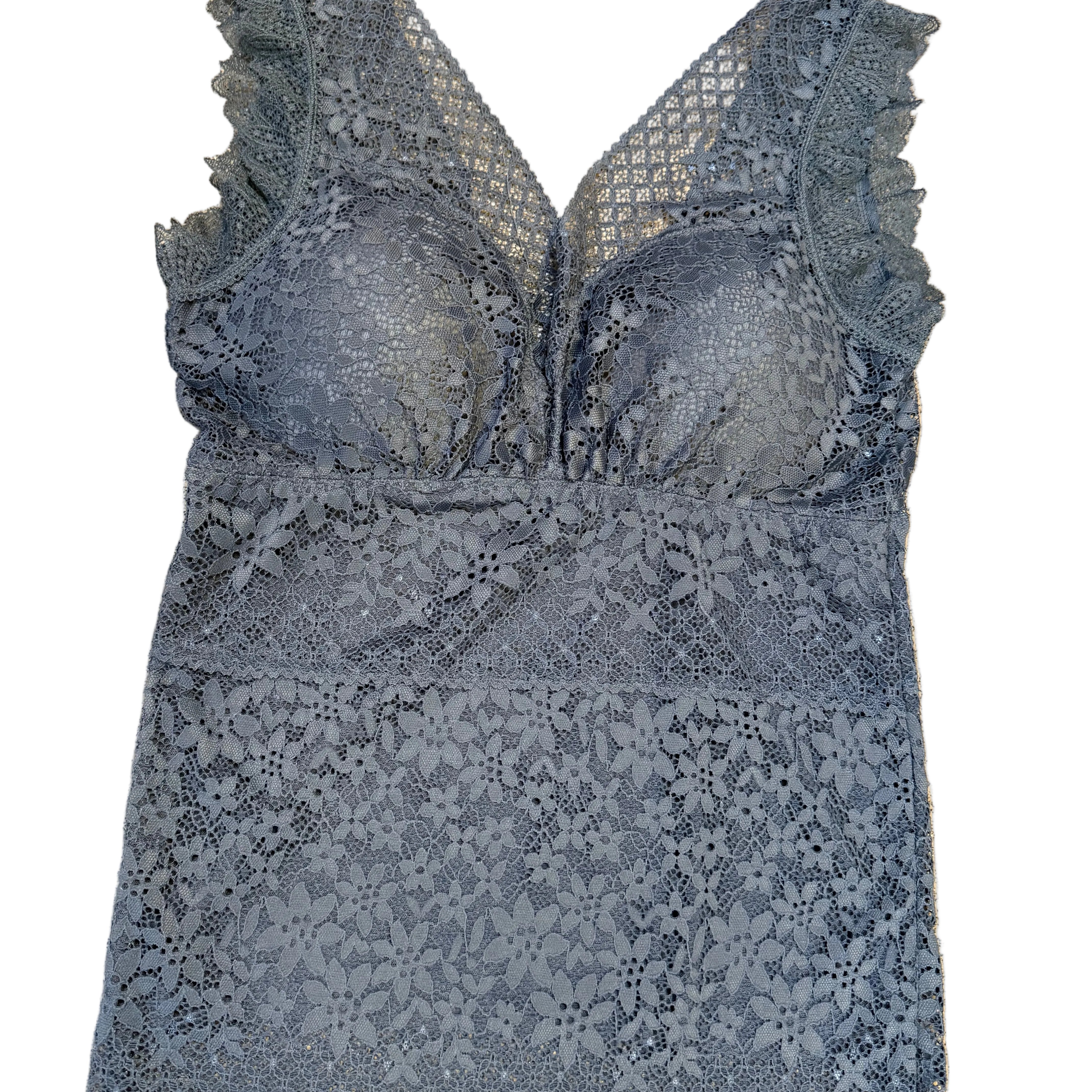 Lace lingerie set on a beige carpet