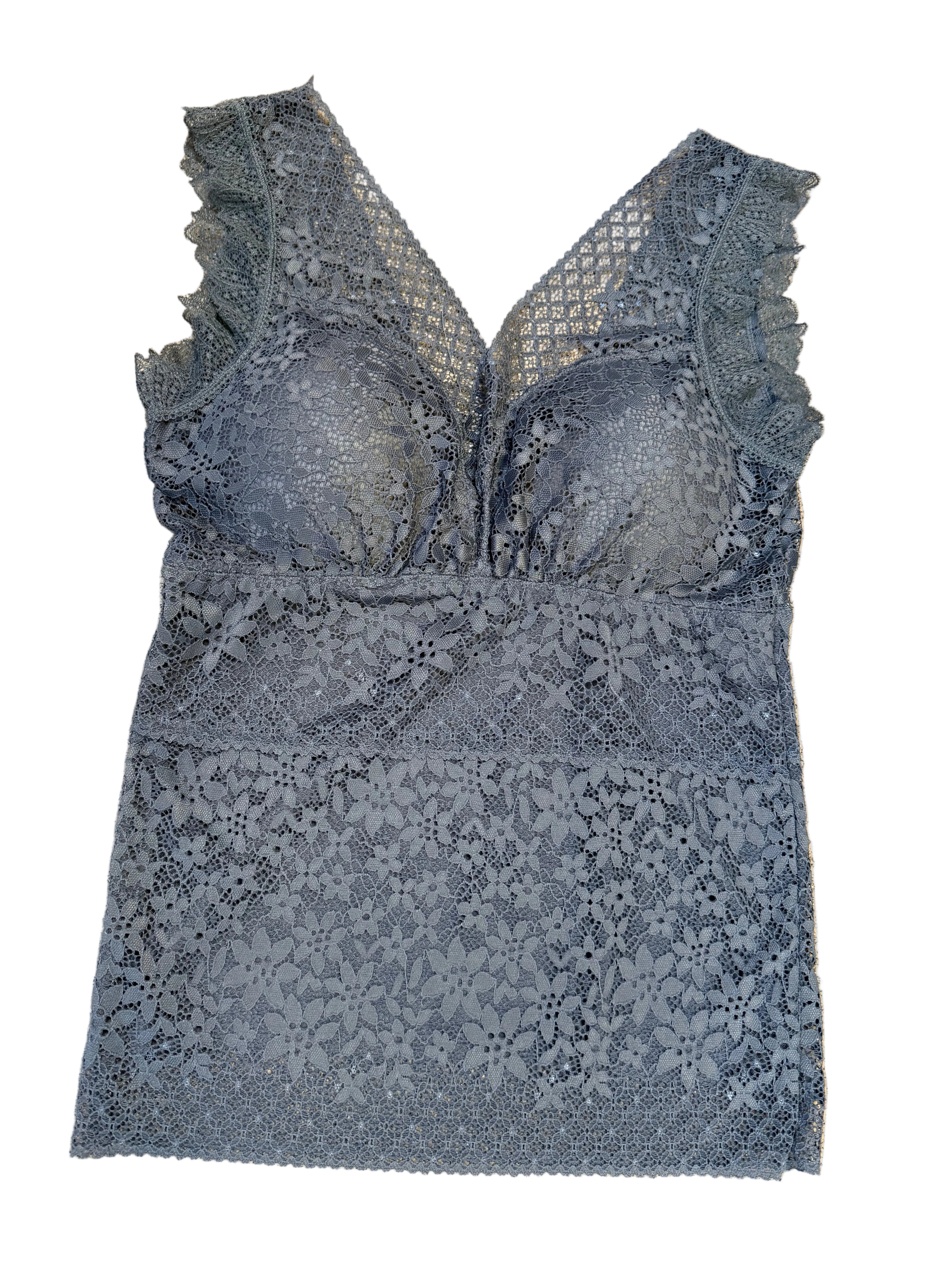 Lace lingerie set on a beige carpet