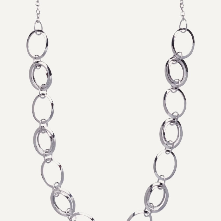 Silver chain necklace on a white background