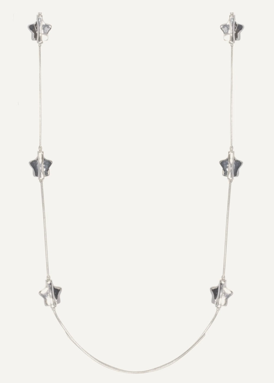 Silver necklace with star-shaped pendants on a white background