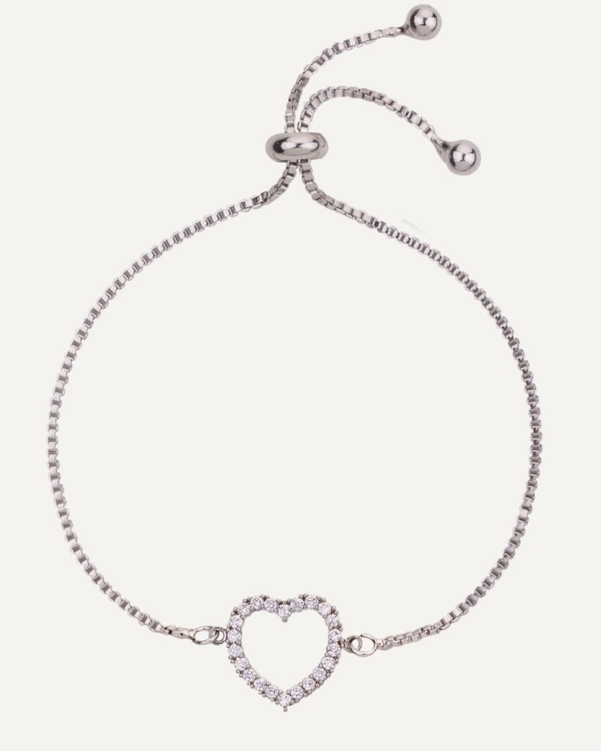 Silver bracelet with a heart-shaped clasp on a white background
