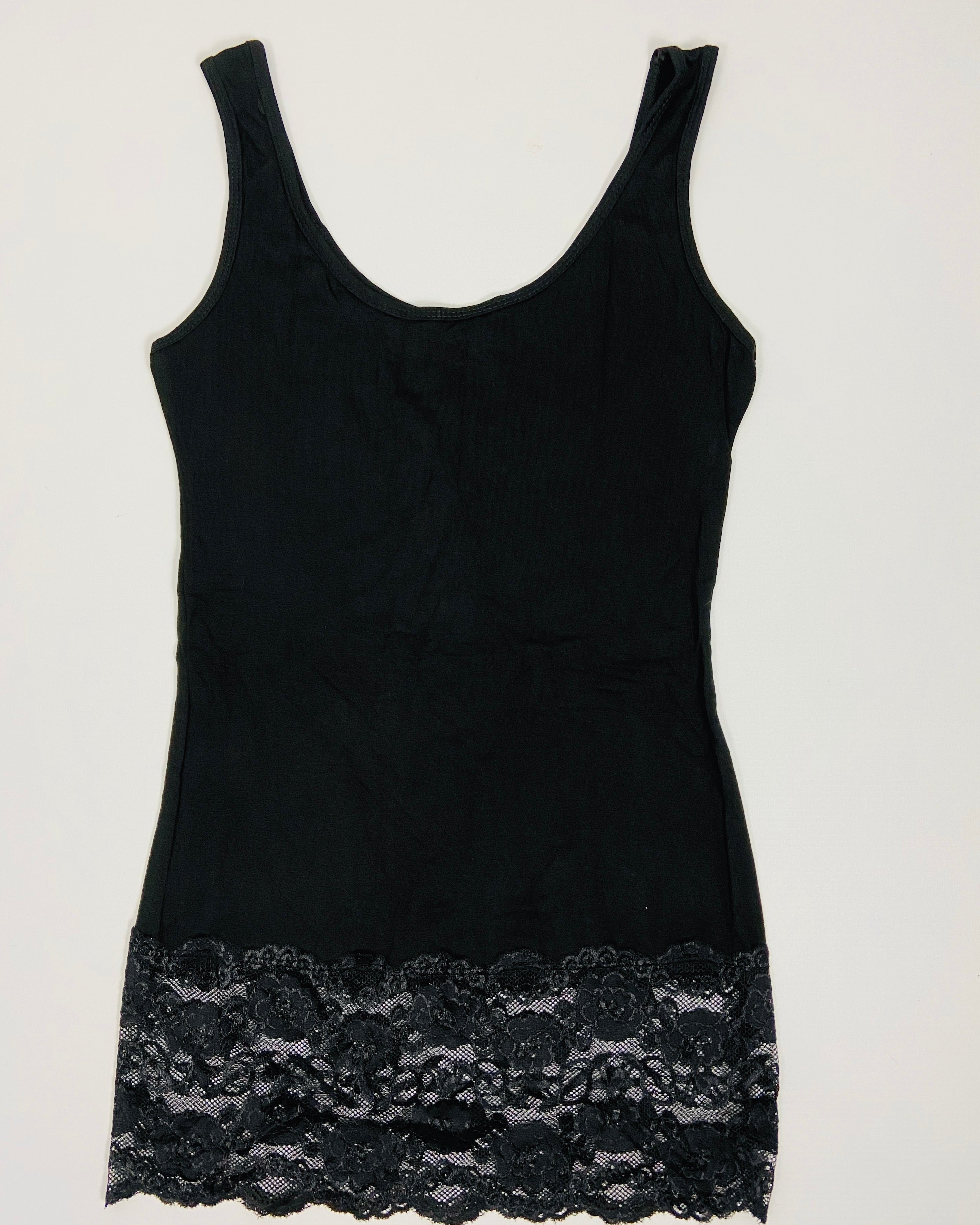 Black tank top with lace trim on a white background