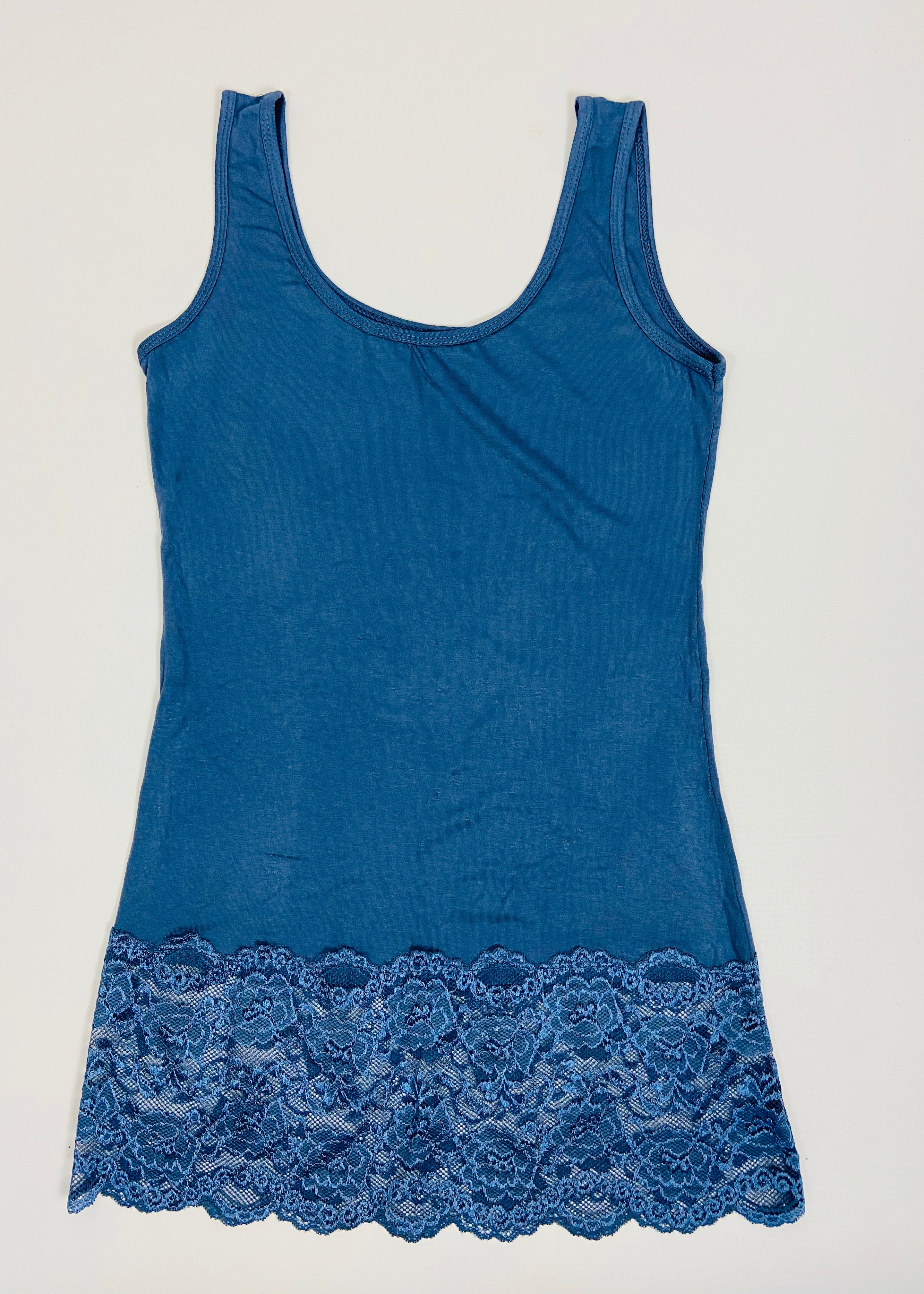 Blue tank top with lace trim on a light gray background