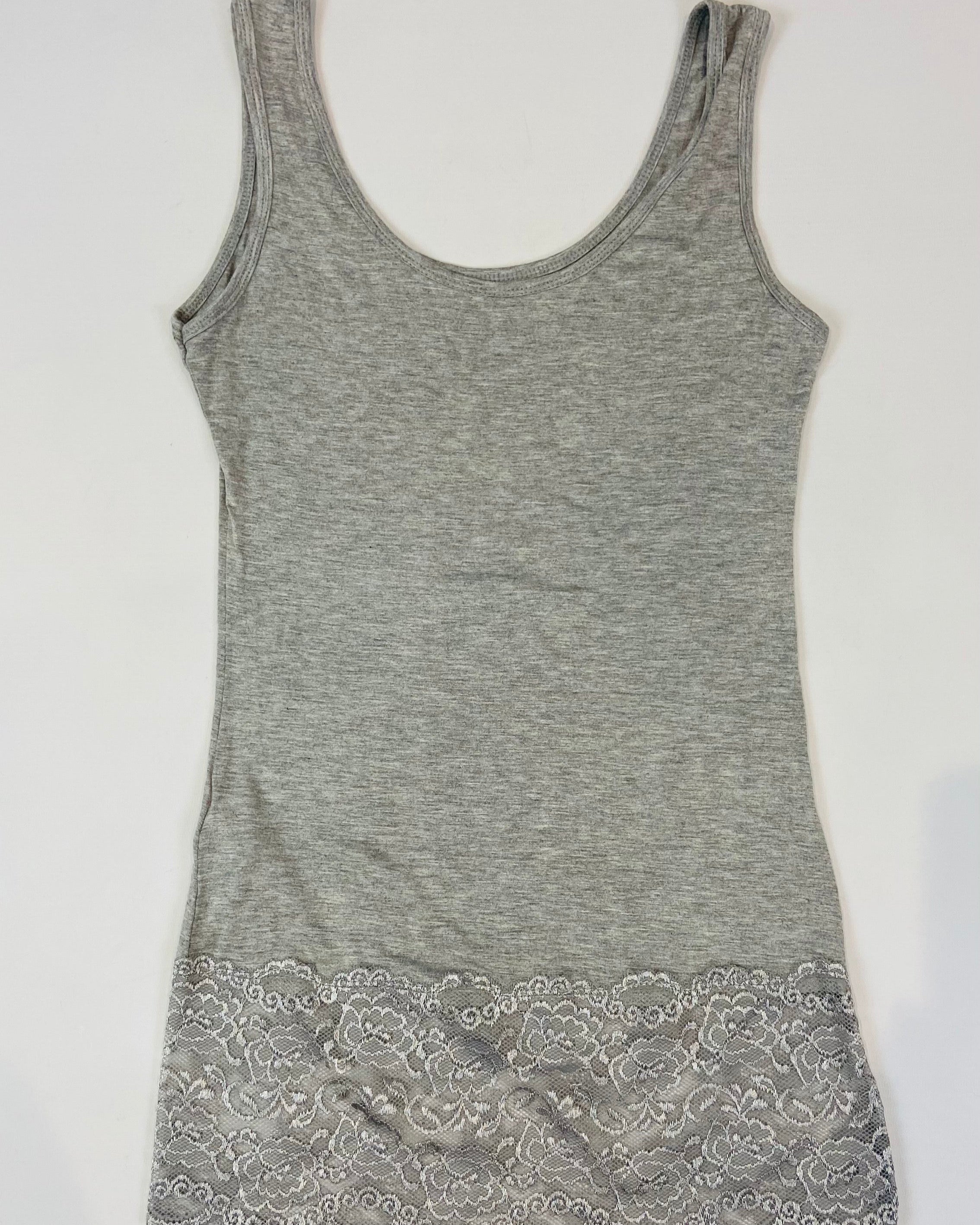 Gray tank top with lace trim on a white background