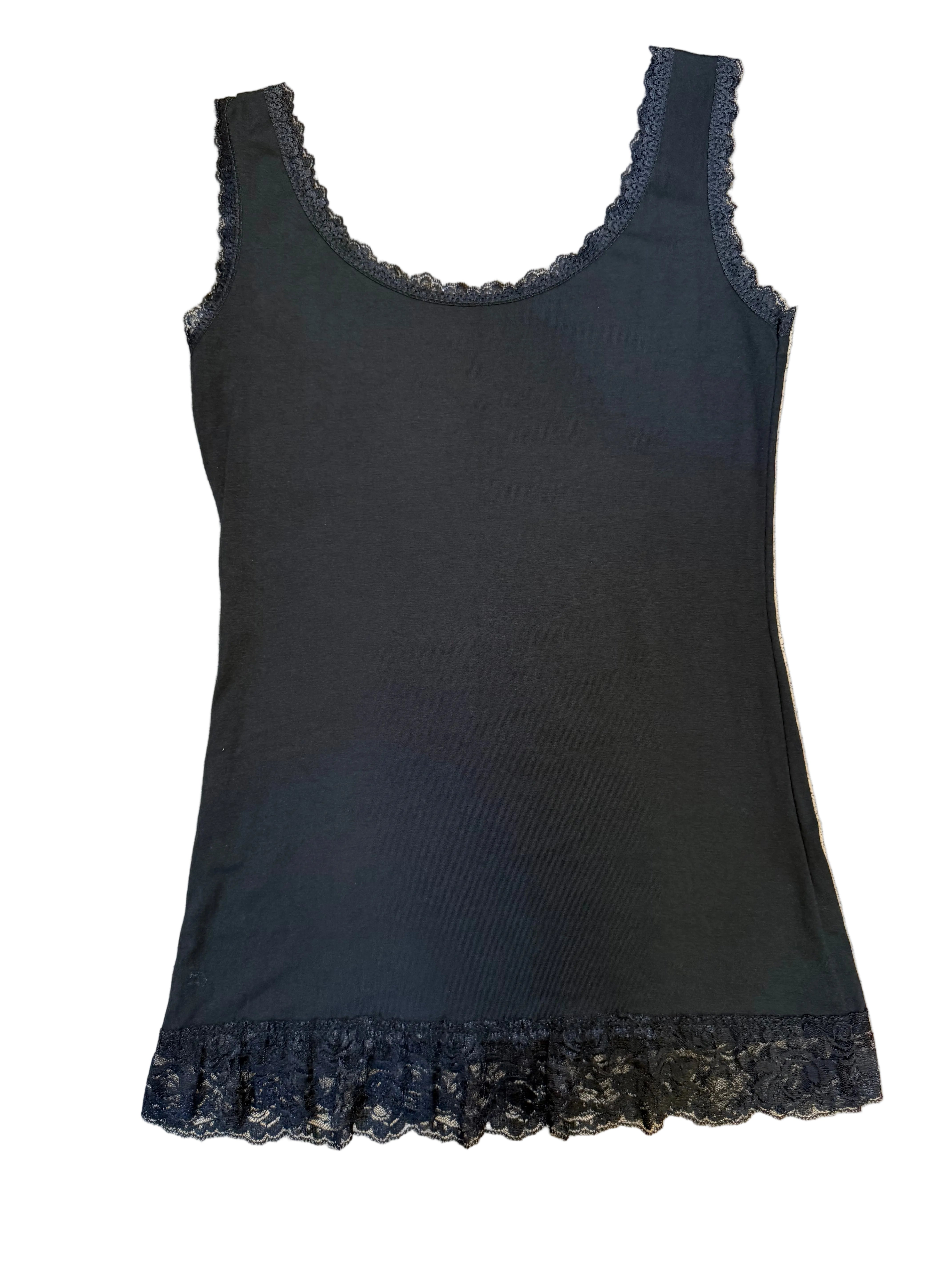 Black tank top with lace trim on a beige carpet