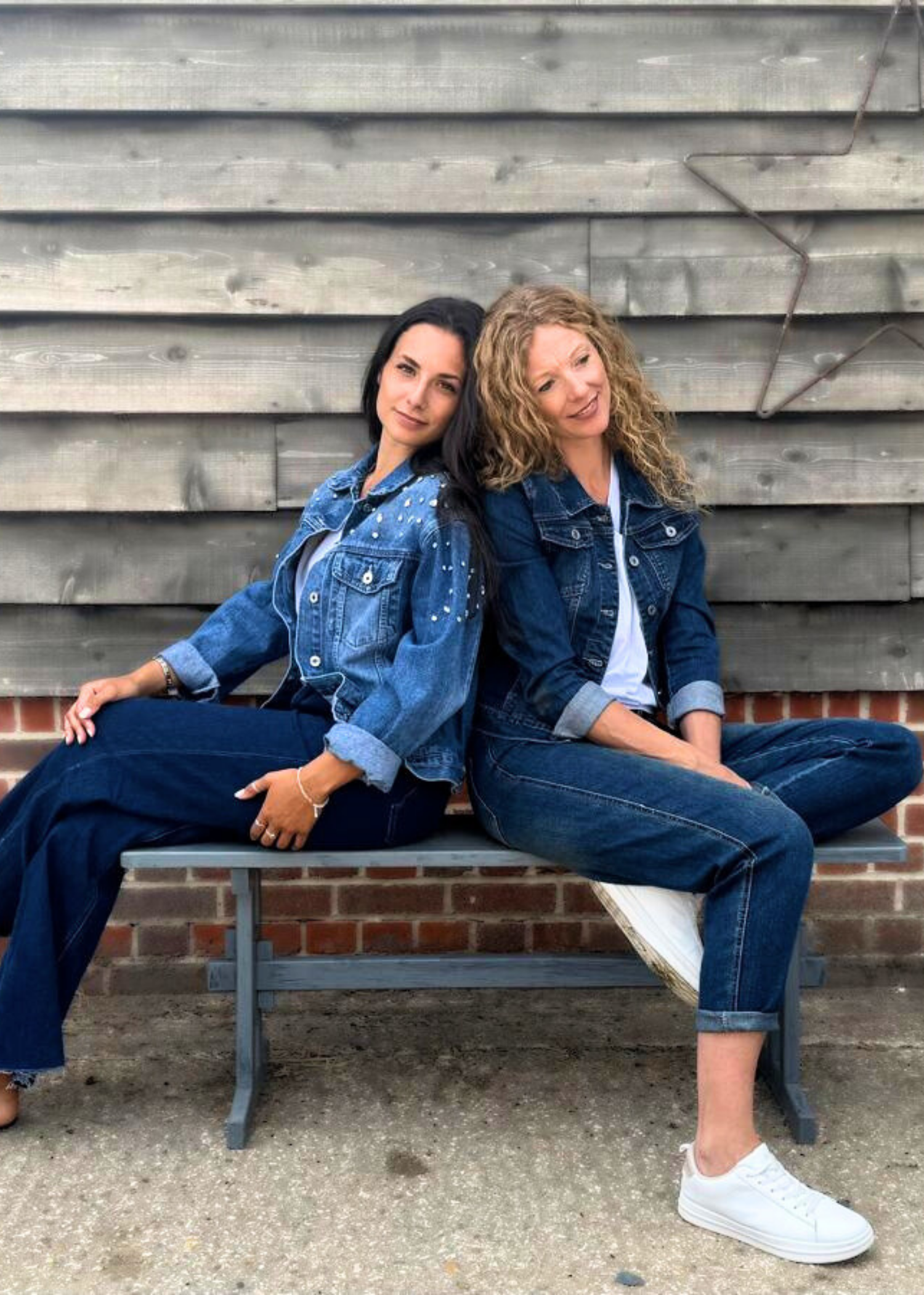 Ladies wearing denim jackets and denim jeans in different styles.