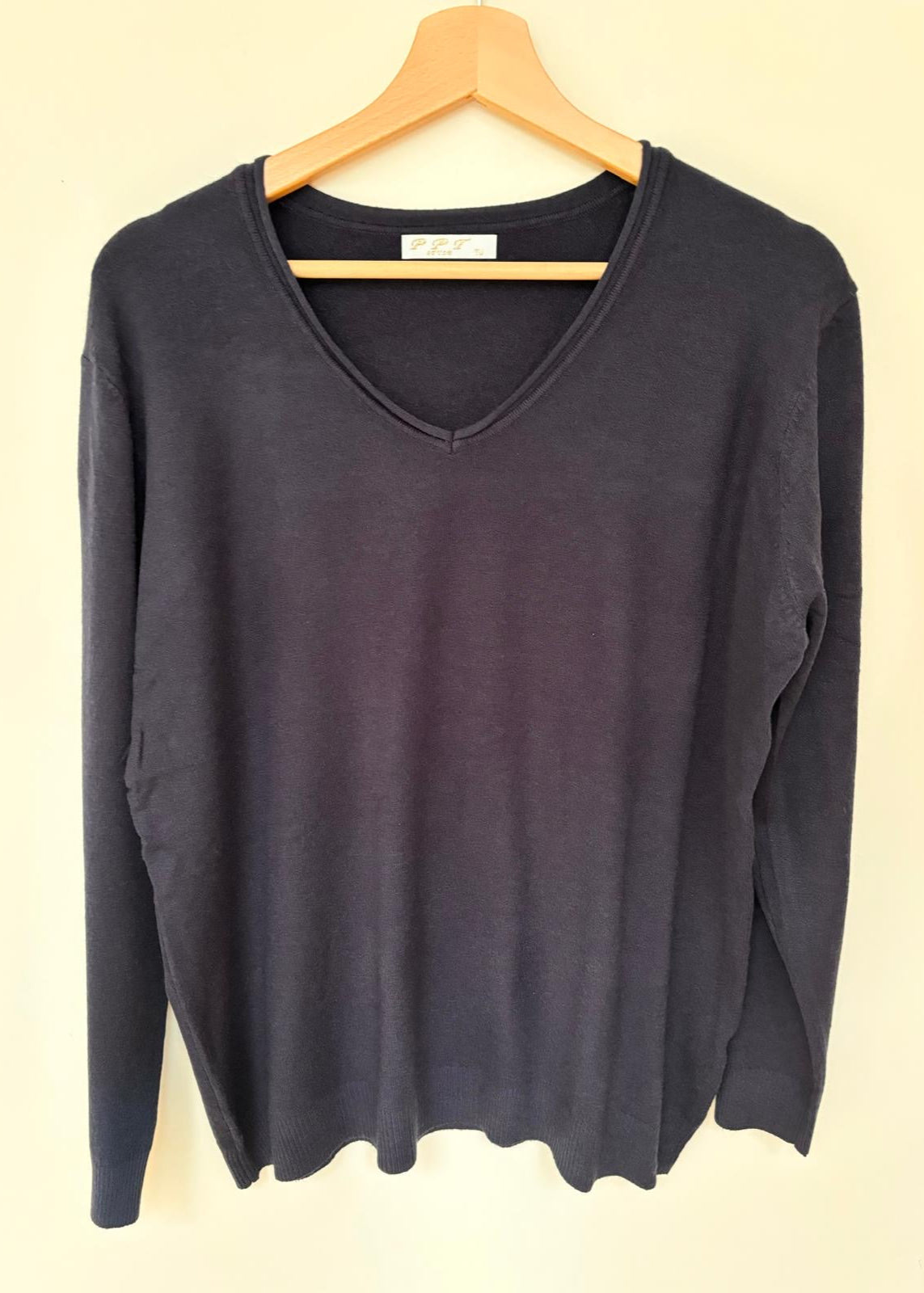 Black V-neck jumper
